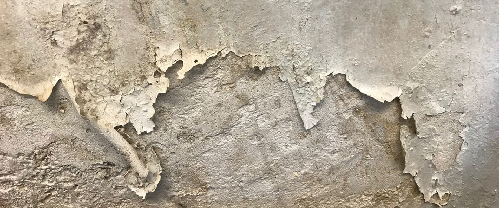 Does house paint crack on canvas?