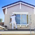 How many sq ft does a 5 gallon bucket of paint cover exterior?